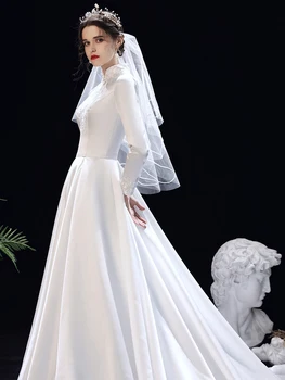 Jaunavedžių VESTUVIŲ suknelė prabangus satino balto vestuvių suknelės ilgomis RANKOVĖMIS PLIUS DYDIS jubiliejaus ceremonija Musulmonų vestuvinė SUKNELĖ