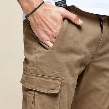 KUEGOU vyriškos laisvalaikio kelnės mados plonas Šviesos koja kelnės Pavasarį, vasarą daug kišenių kombinezonai su antkrūtiniais bendras vyrų KK-2918